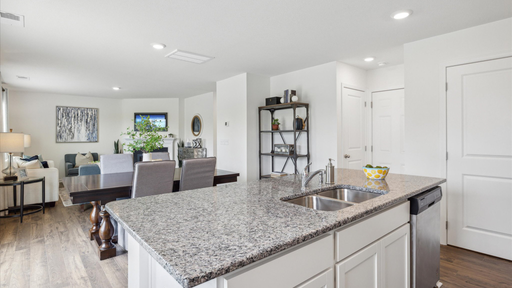 Open concept living, dining, and kitchen space