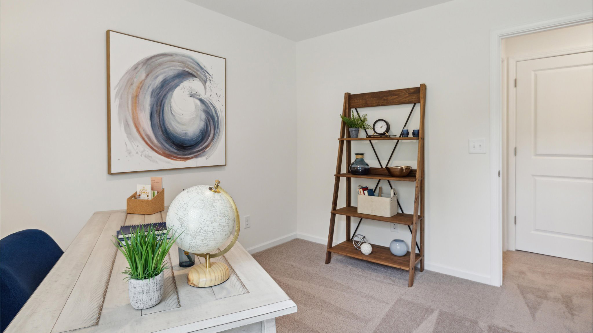 Bedroom with ample natural light and carpet floors