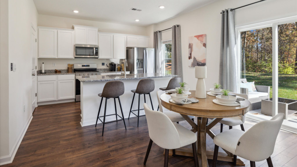 Open dining room space adjacent to kitchen