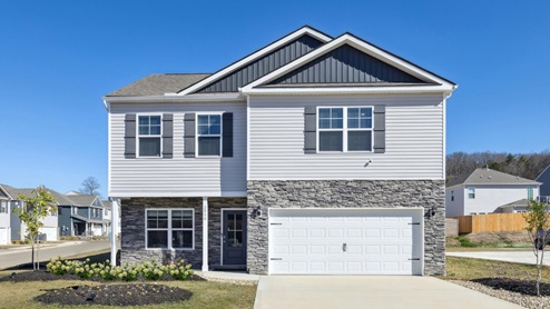 exterior home with vinyl and brick siding