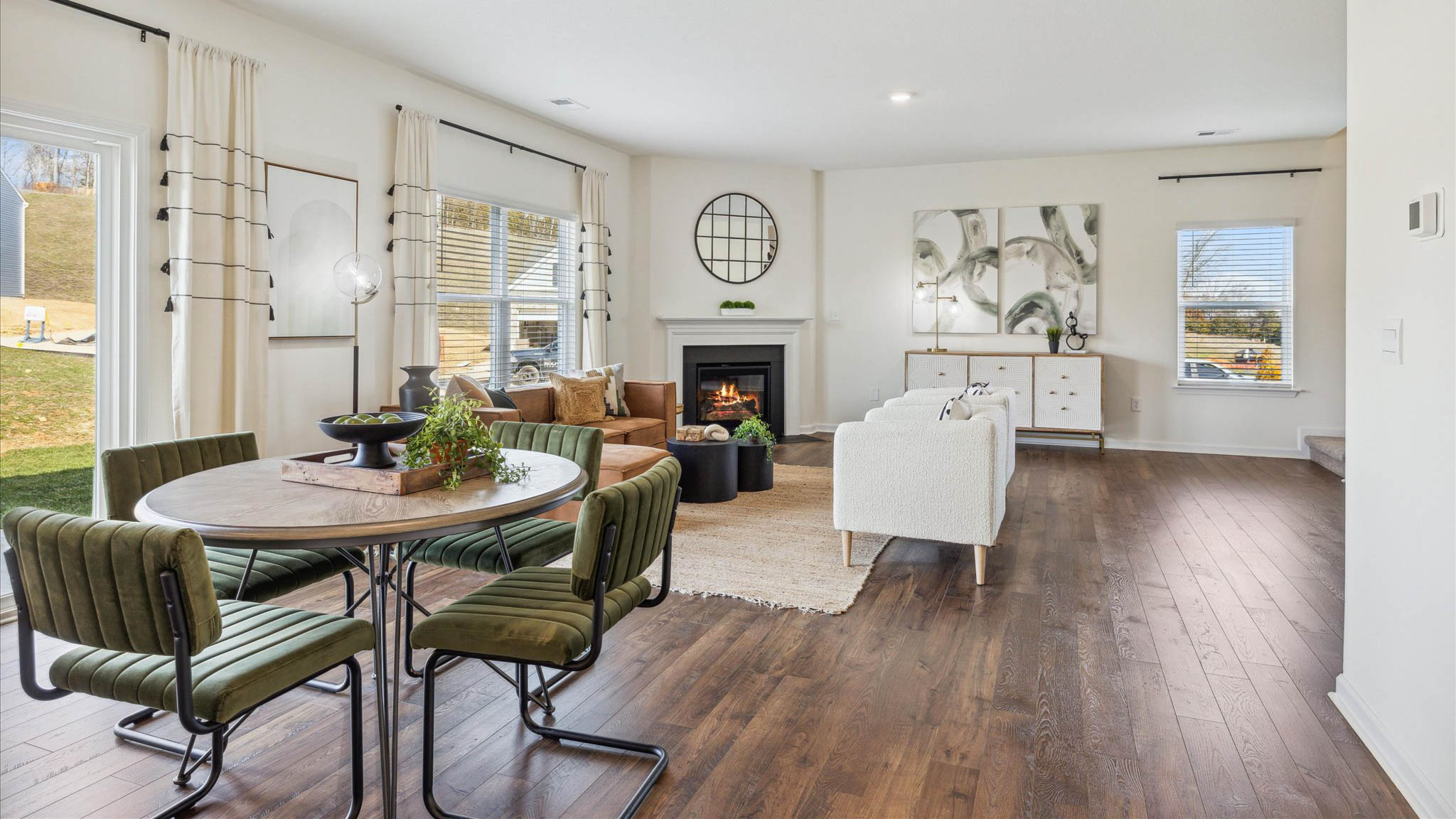 Open concept living, dining, and kitchen space