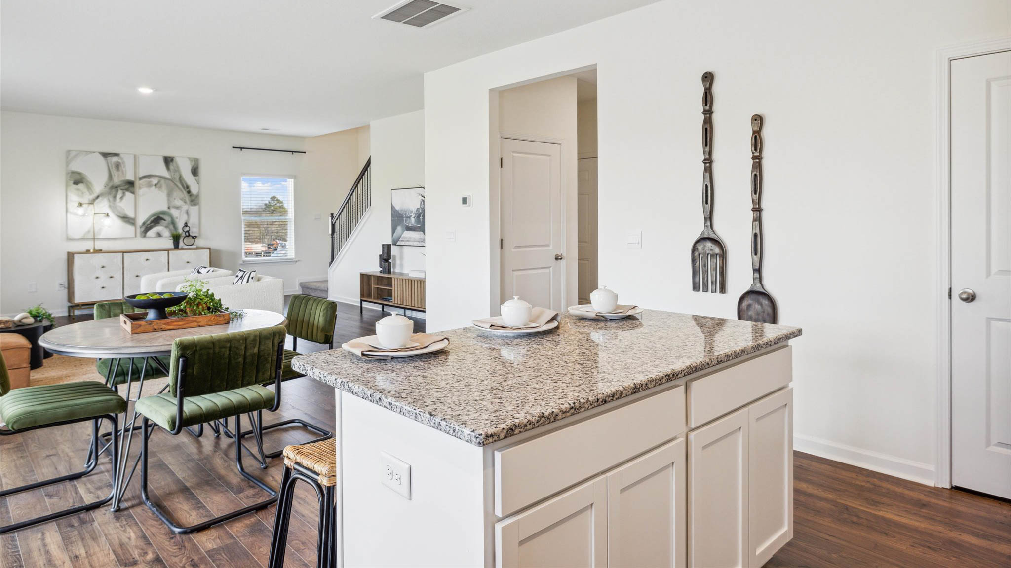 Spacious open concept kitchen with island and counter prep space