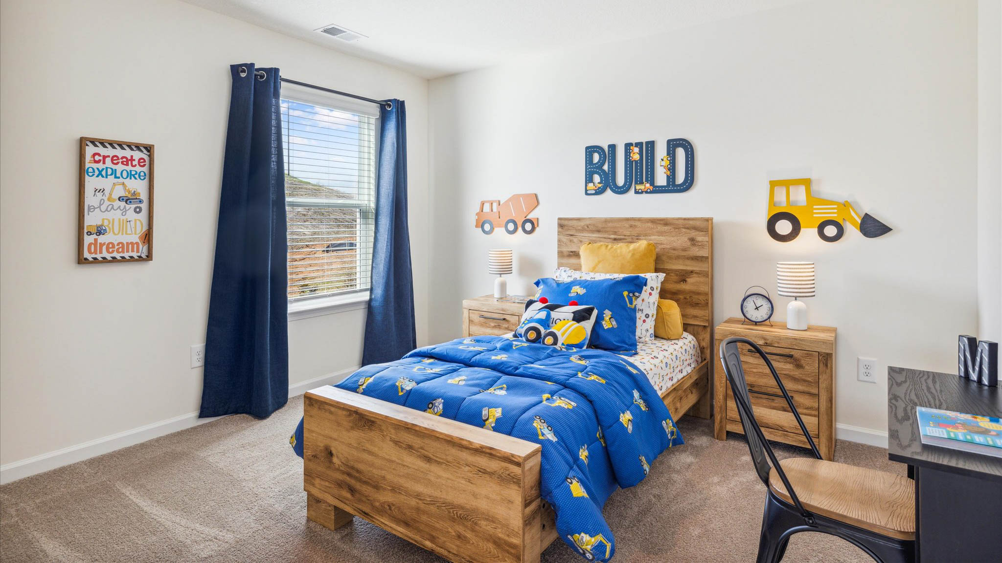 Bedroom with ample natural light and plush carpet floors