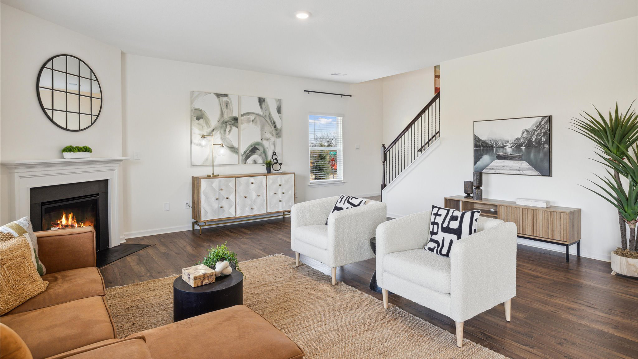 Open concept living, dining, and kitchen space