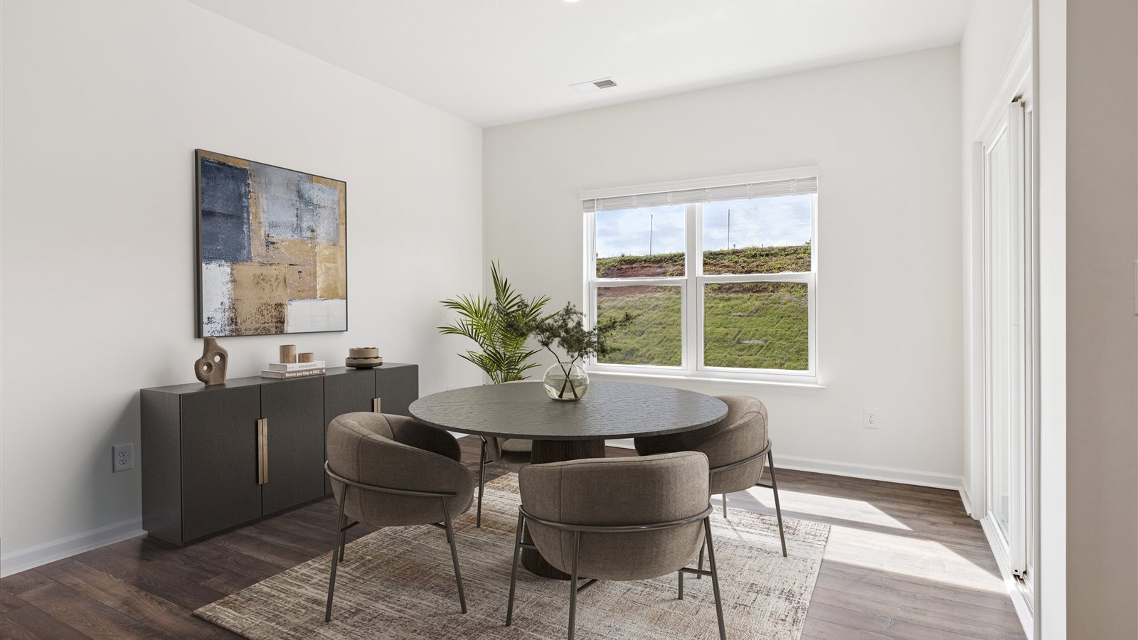 Open concept living, dining, and kitchen space