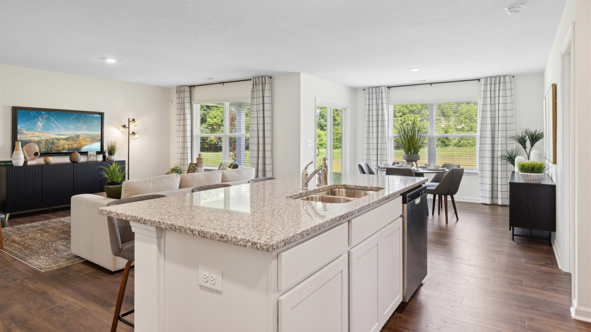 view of kitchen island looking into living room