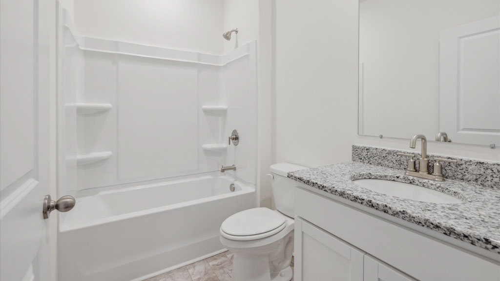 Bathroom with combination shower and bathtub
