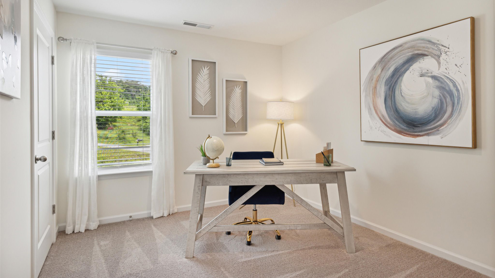 Bedroom with ample natural light and carpet floors