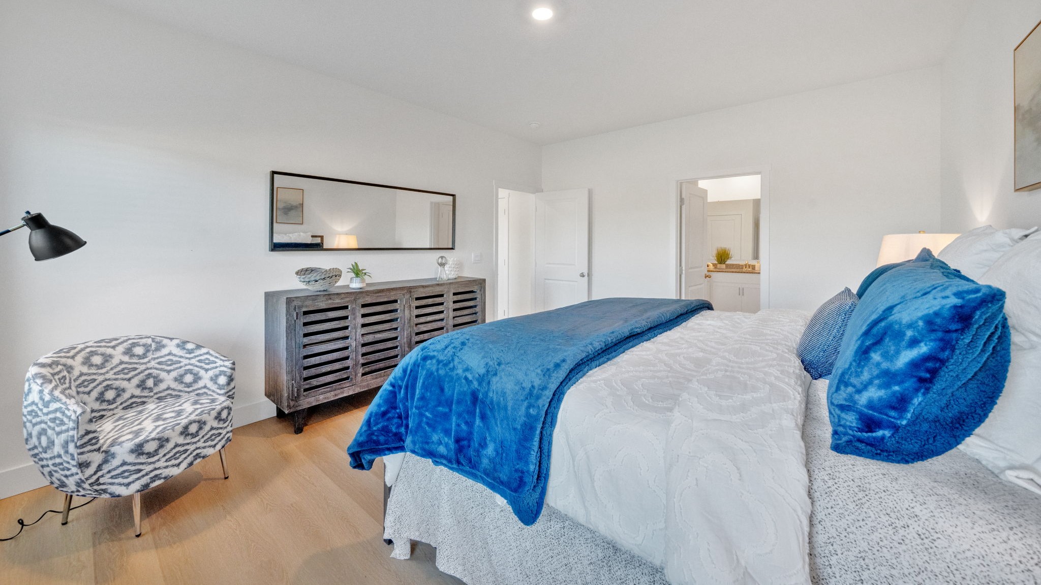 Bedroom with ample natural light and carpet floors
