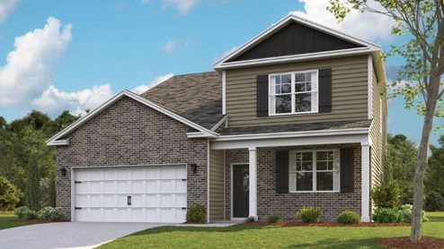 Exterior of two story brick home with sand color wood cladding and a two car garage