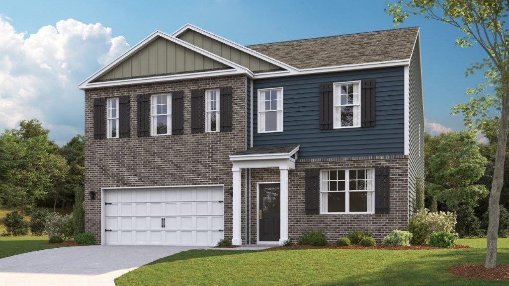 Exterior of two story home with brick and dark blue wood cladding with a two car garage