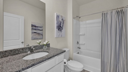 Guest bathroom with granite countertop