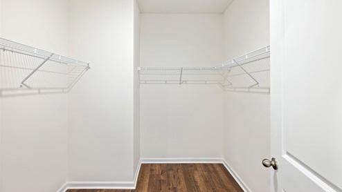 Primary closet with shelving
