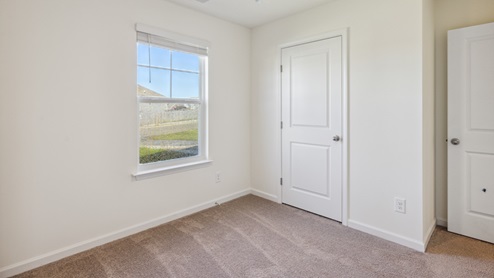 bedroom with carpet