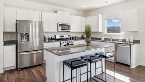 Kitchen island with stainless steel appliances