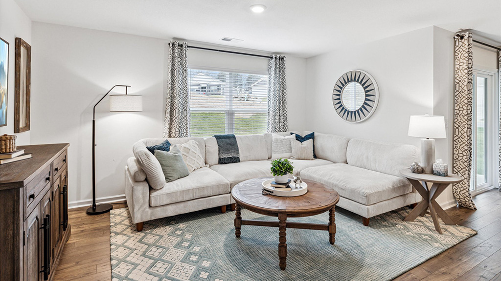 Open concept living, dining, and kitchen space