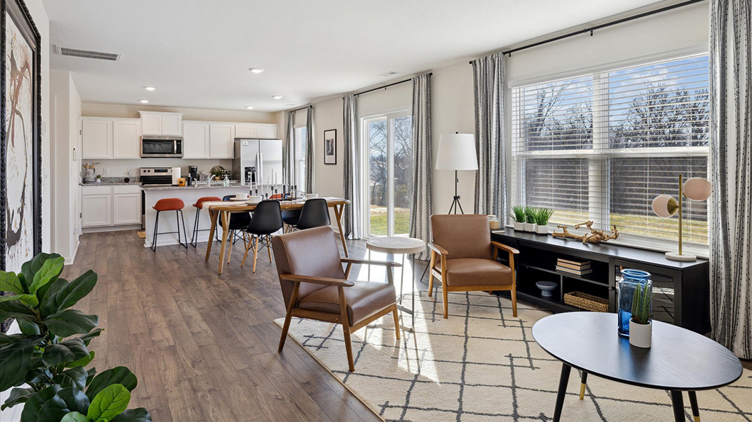 Open concept living, dining, and kitchen space