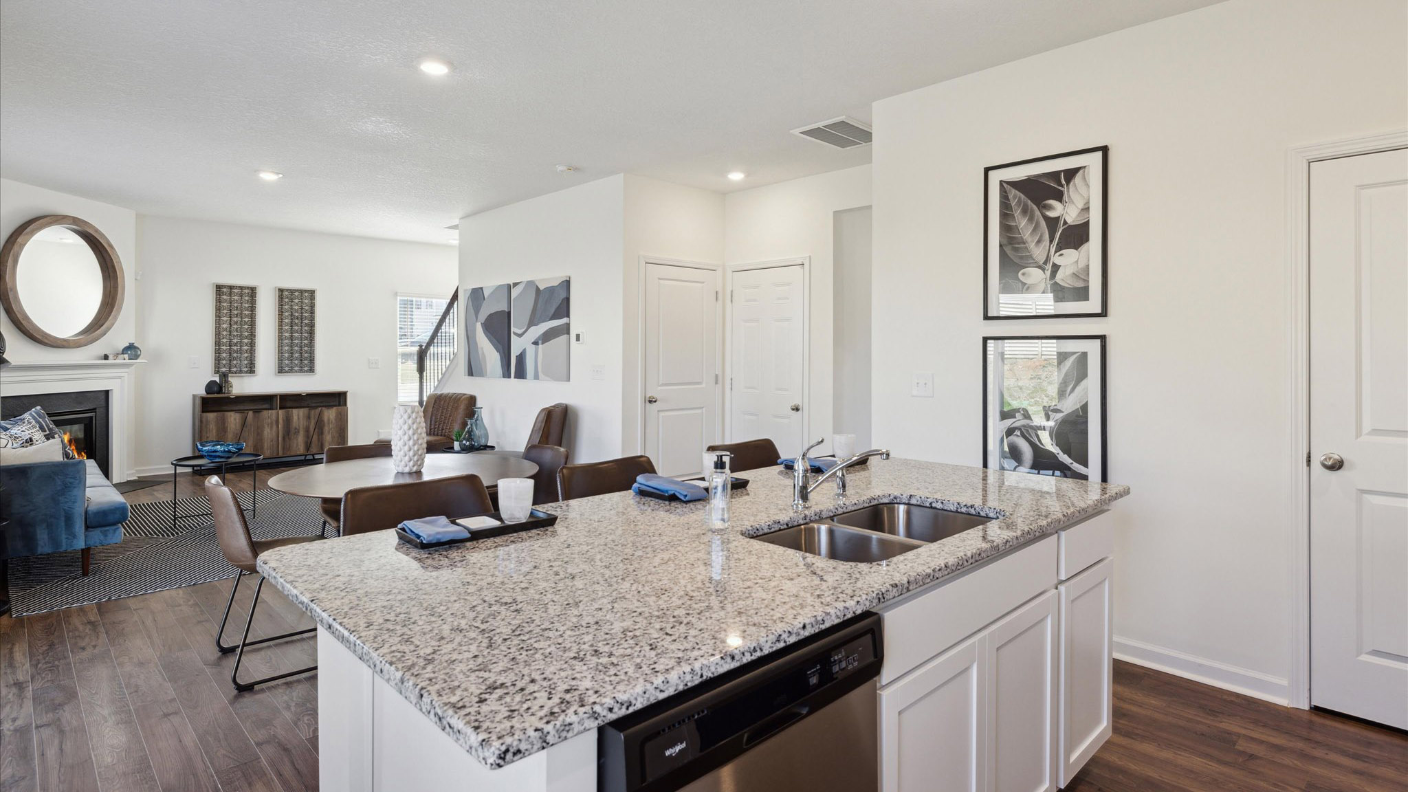 Open concept living, dining, and kitchen space