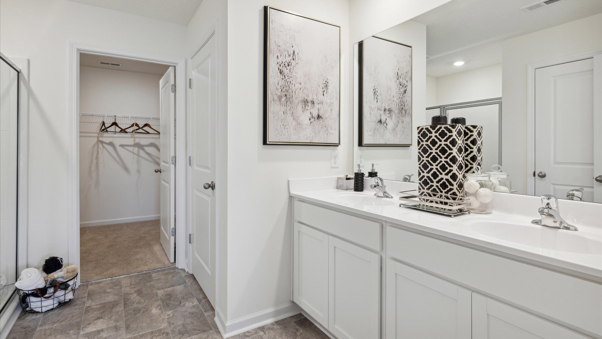 Private attached primary bathroom with built in vanity