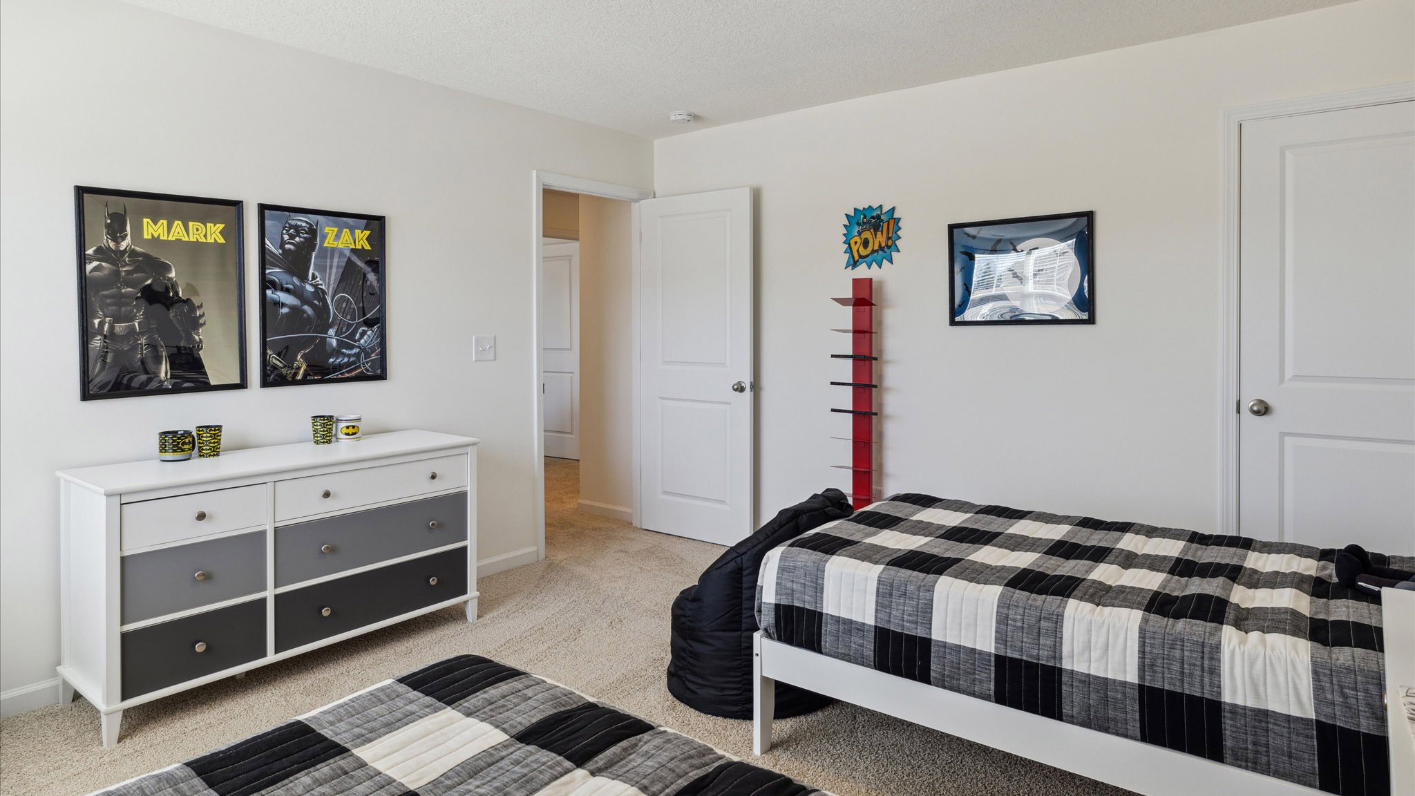 Bedroom with ample natural light and carpet floors