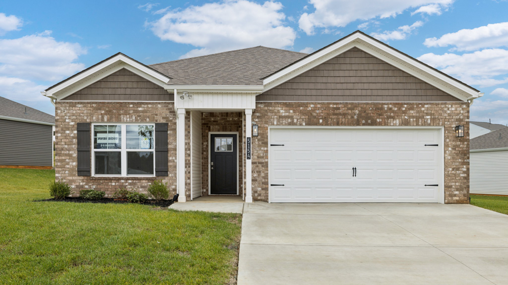 Exterior of single story modern farmhouse home