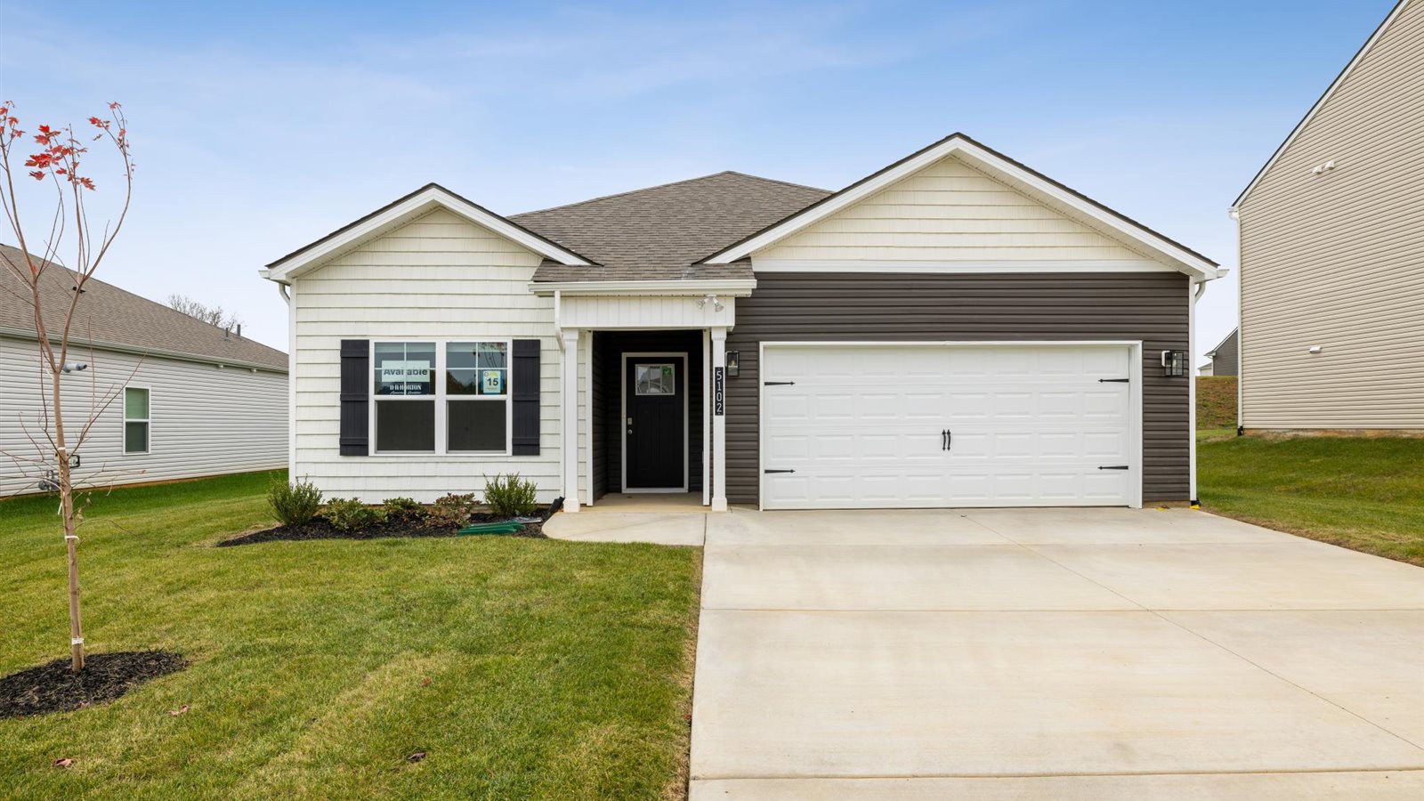 Exterior of single story modern farmhouse home