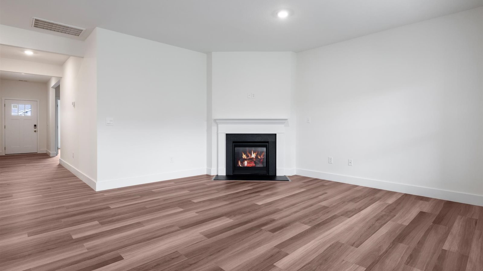 Open concept living, dining, and kitchen space