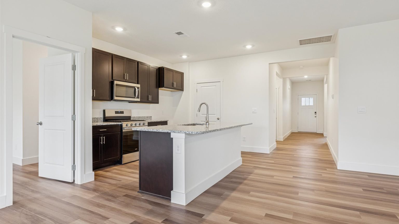 Spacious open kitchen overlooking  living space
