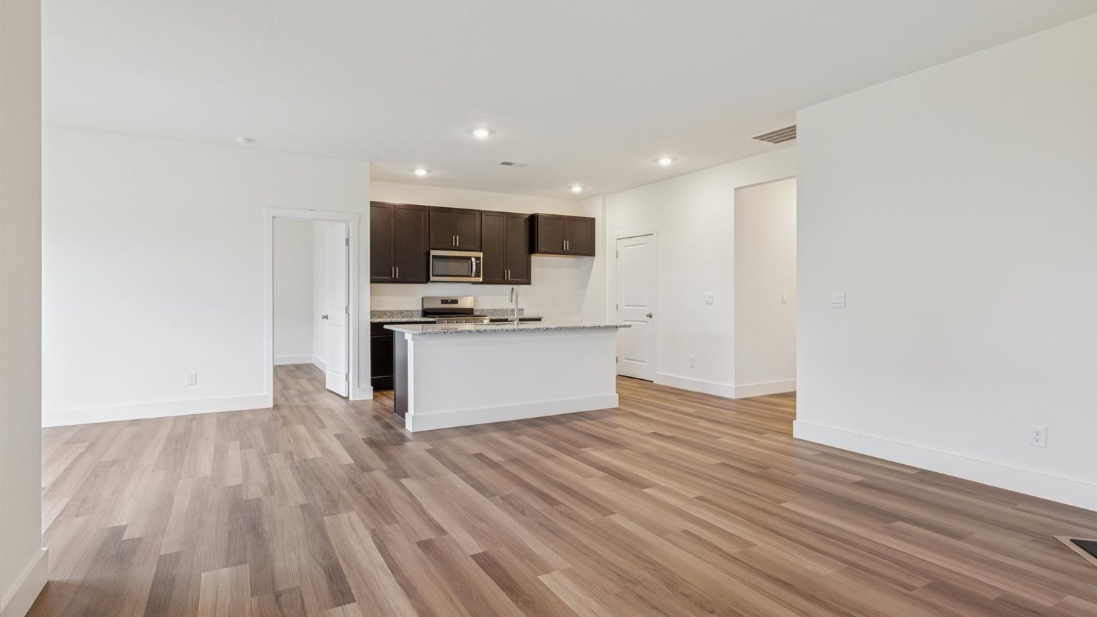 Spacious open kitchen overlooking  living space