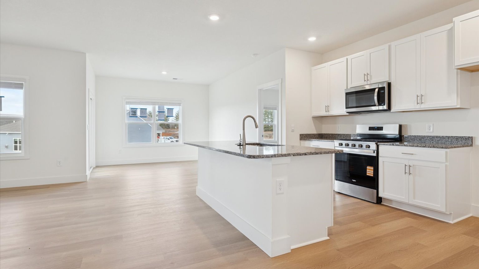 Open living and great room area with ample natural light