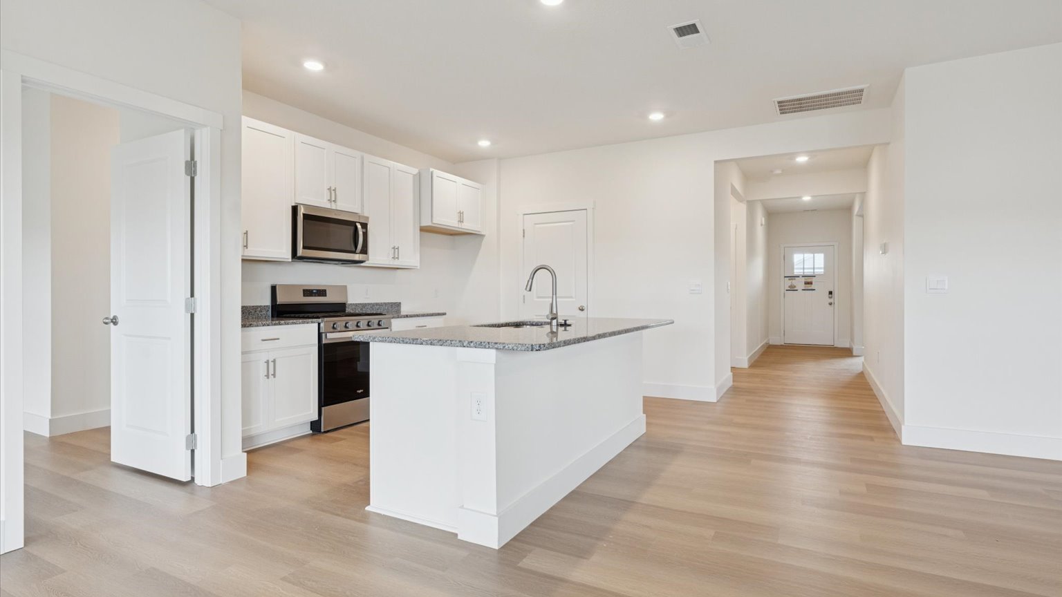 Open living and great room area with ample natural light