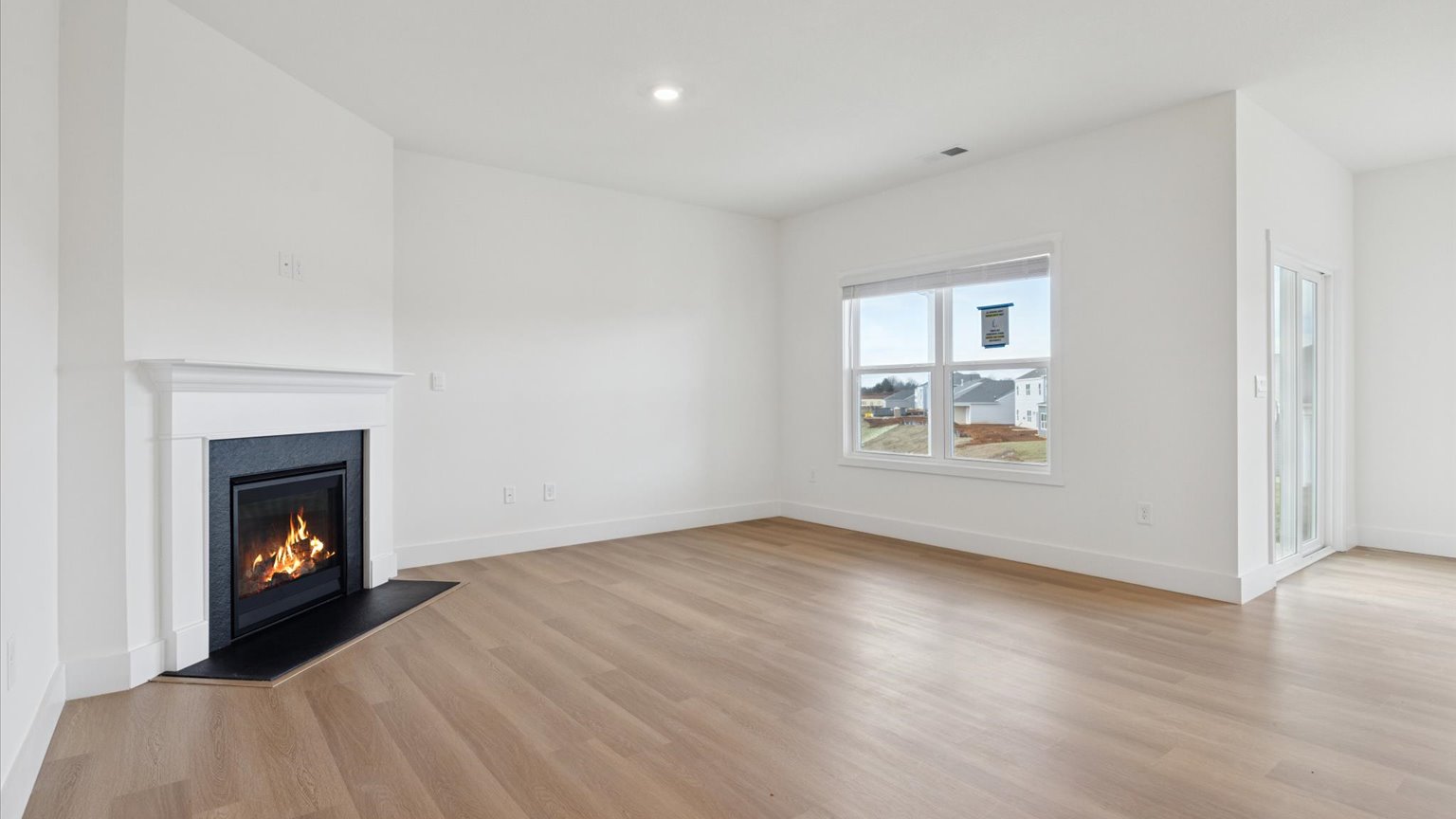 Open living and great room area with ample natural light