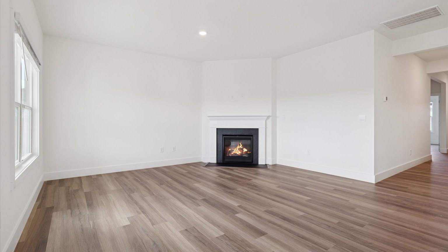 Open living and great room area with ample natural light