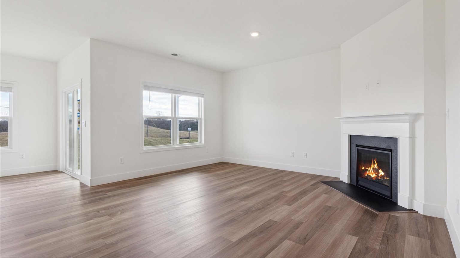 Open living and great room area with ample natural light