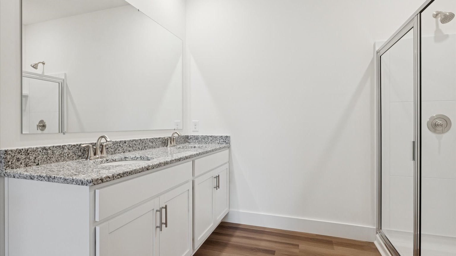 Private attached primary bathroom with built in vanity