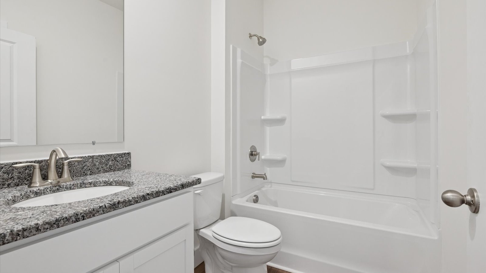 Guest bathroom located between guest bedrooms