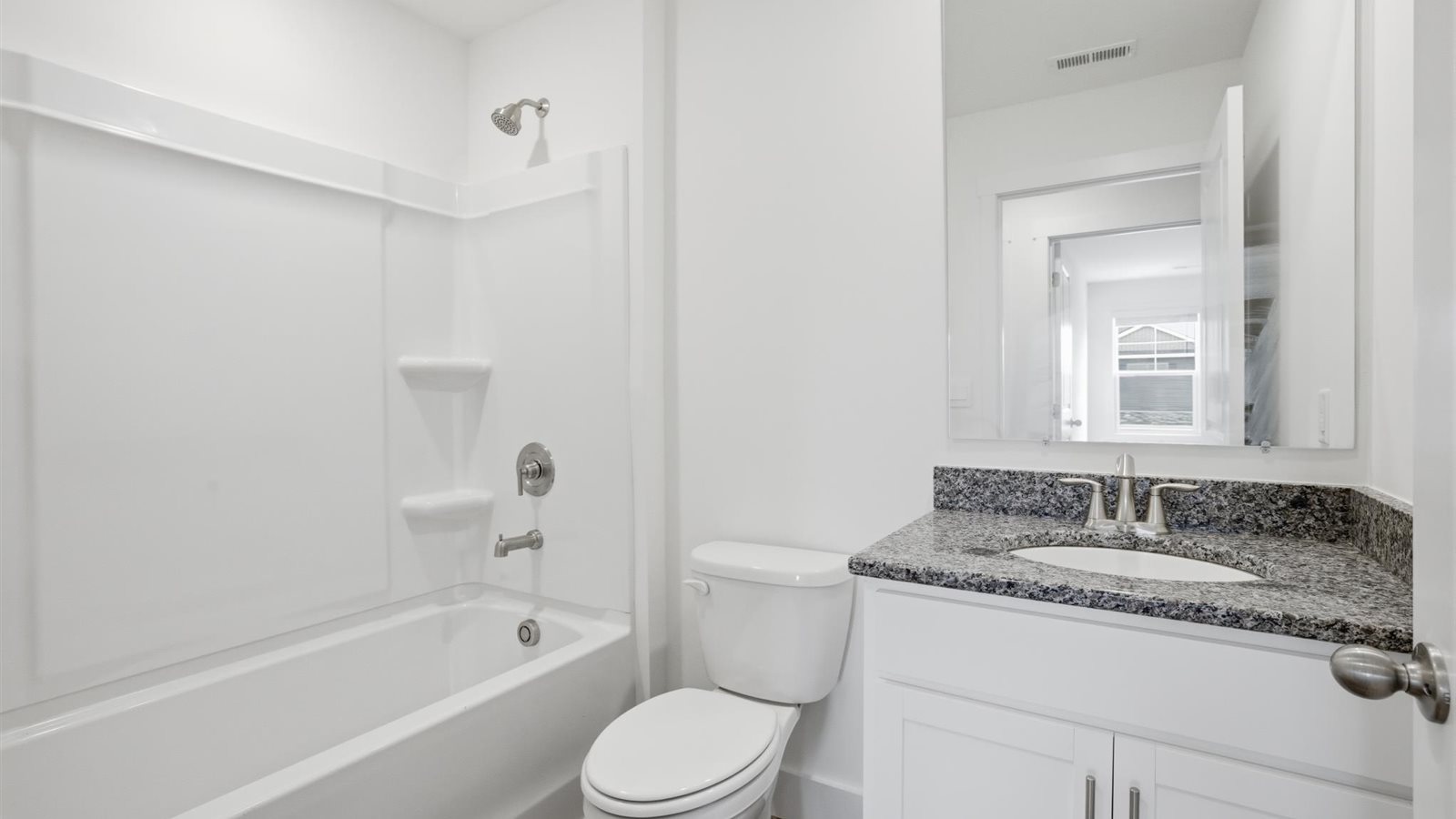 upstairs full bathroom with single vanity and combo tub shower