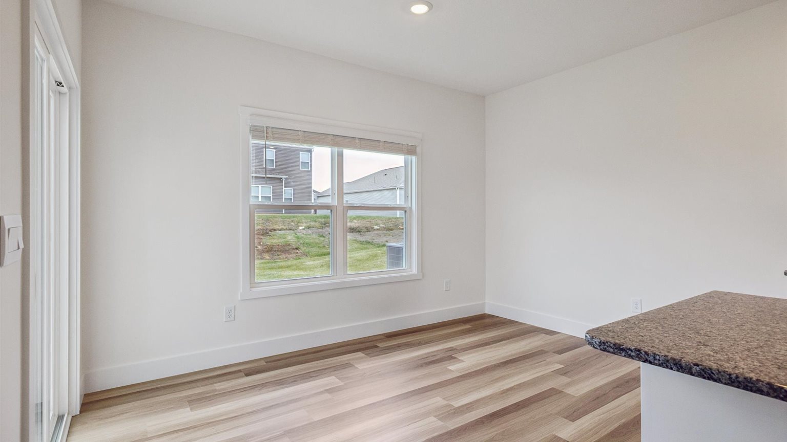 Open concept kitchen, living, and dining room space