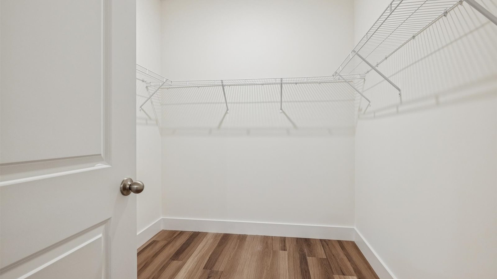 Primary bathroom with attached walk-in closet