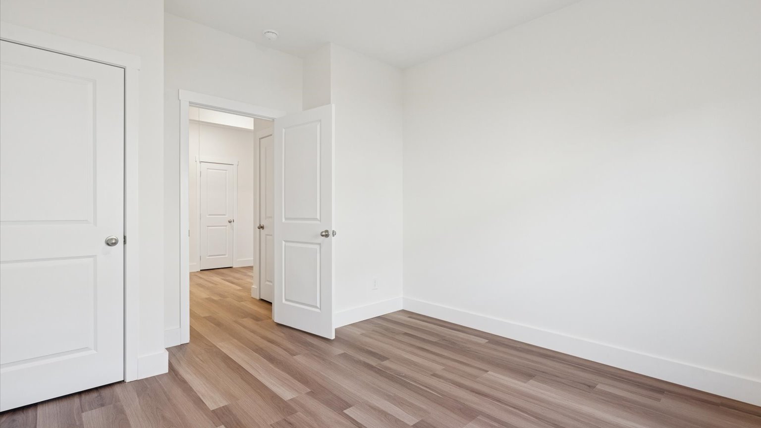 Bedroom with ample natural light and carpet floors