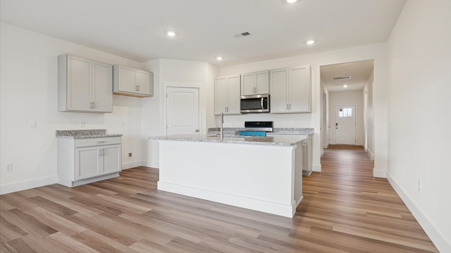 Open living and great room area with ample natural light