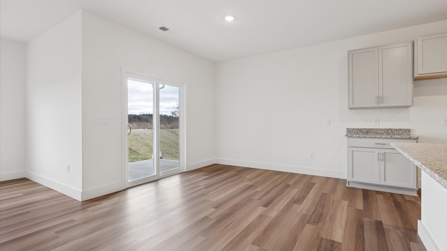 Open living and great room area with ample natural light