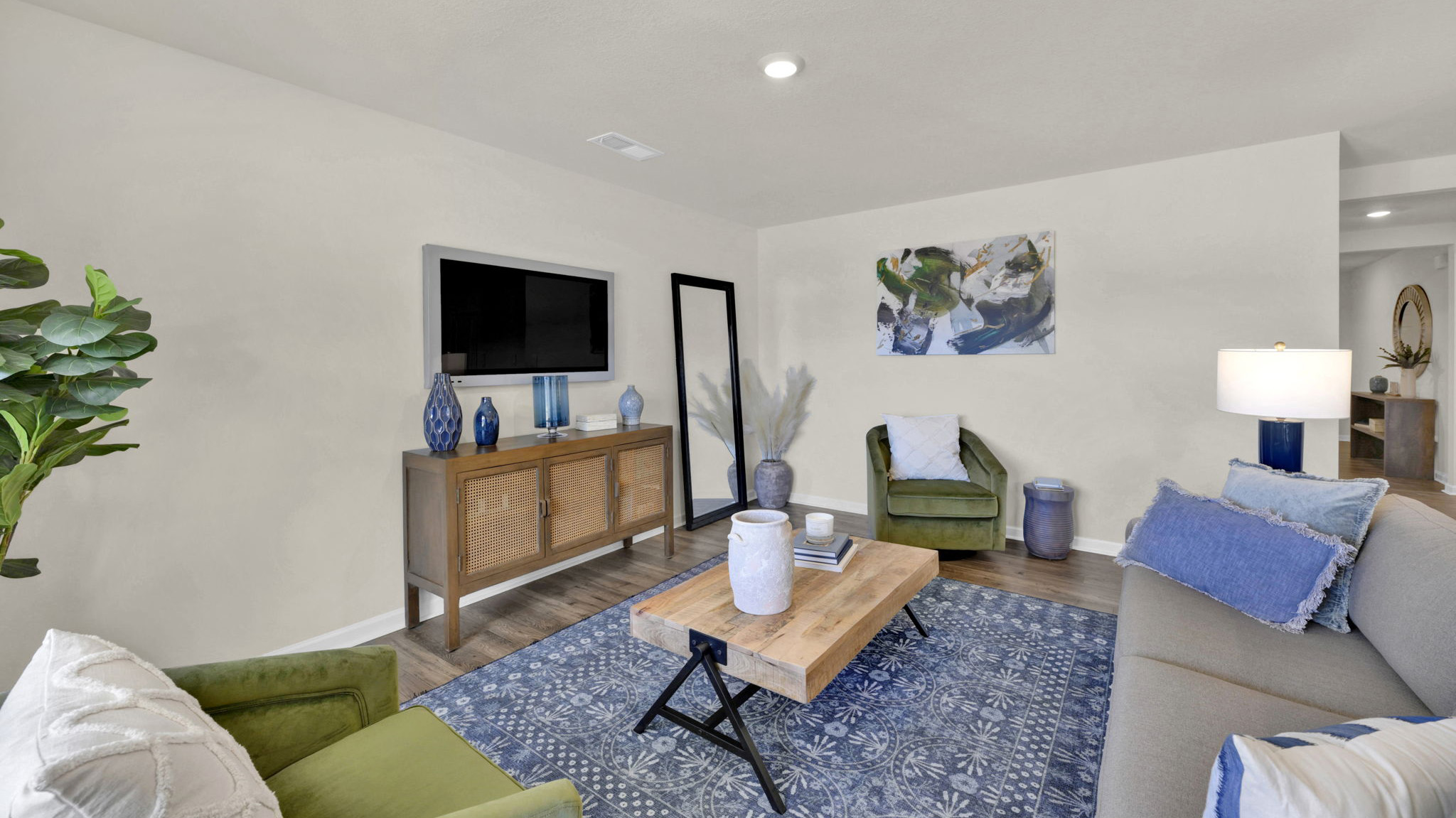 Open concept living, dining, and kitchen space