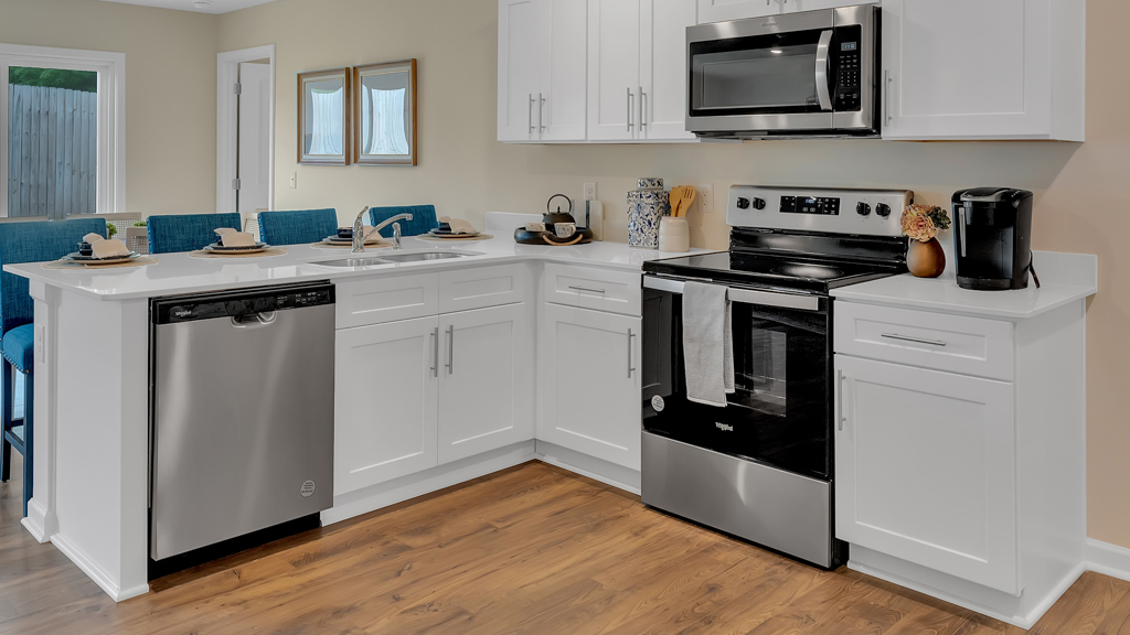 Open concept living, dining, and kitchen space