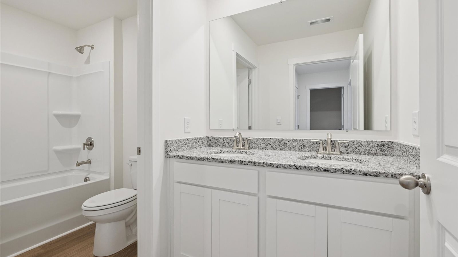 Bathroom with combination shower and bathtub