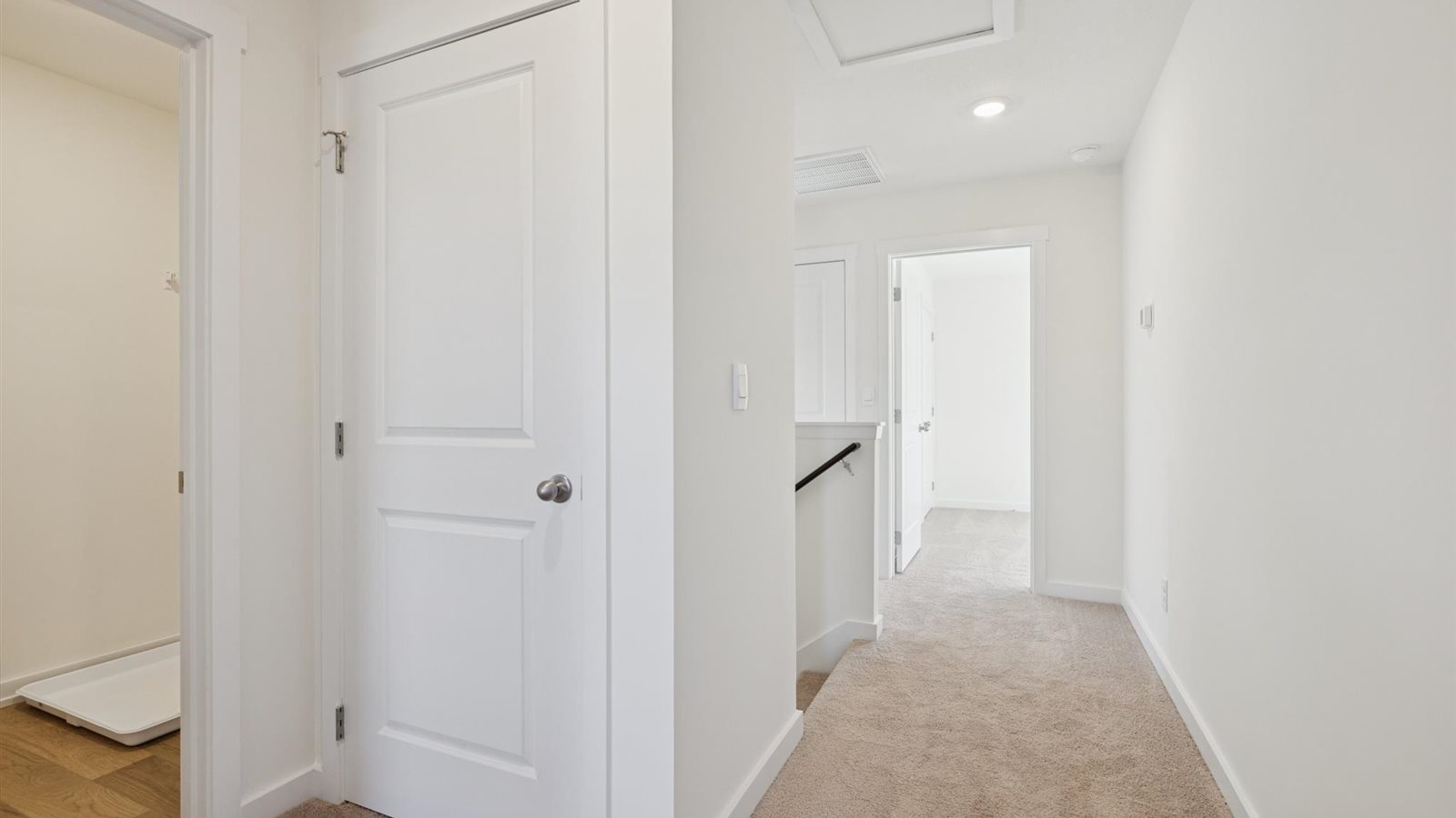 Bedroom with ample natural light and carpet floors