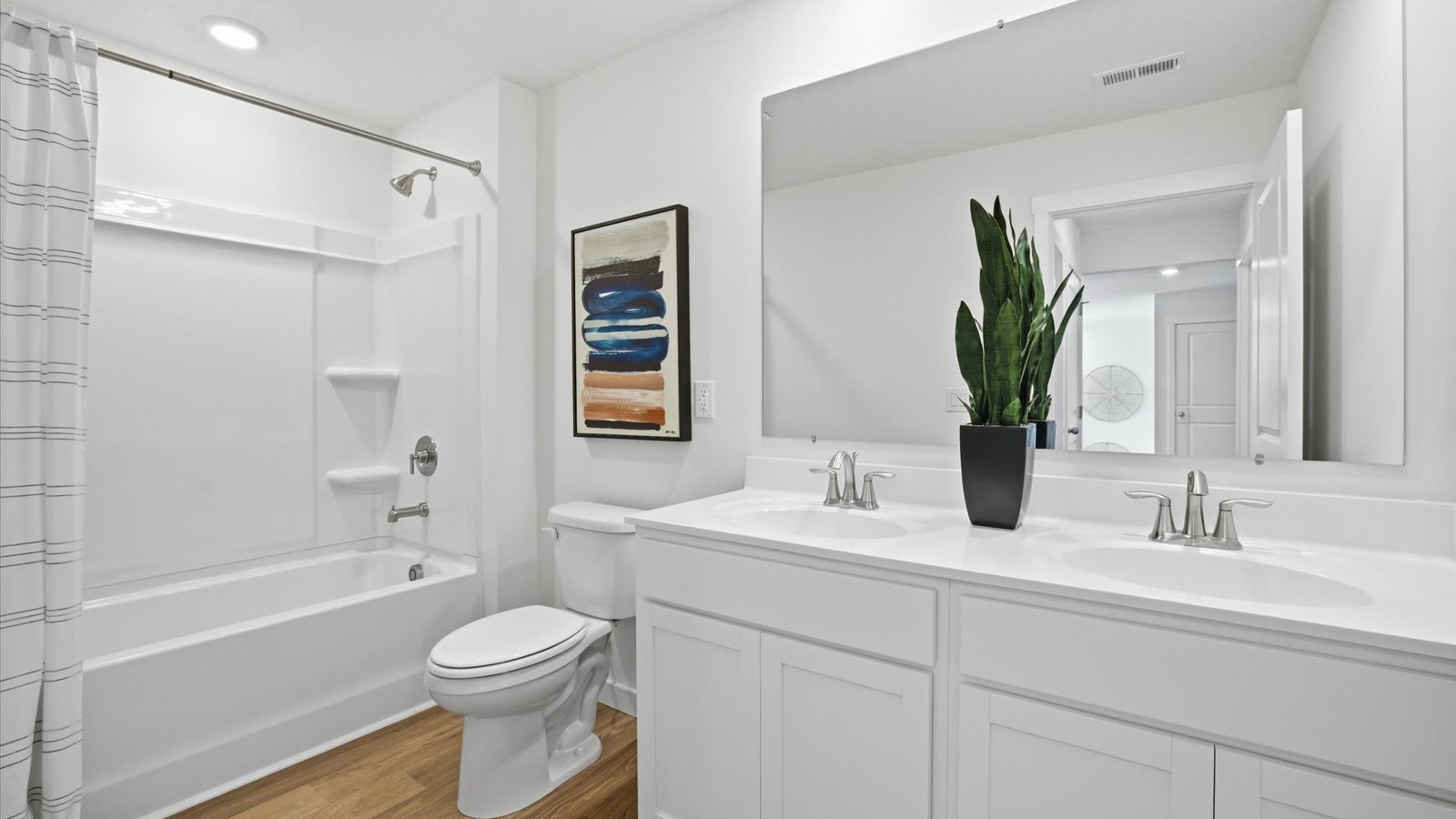 Bathroom with combination shower and bathtub