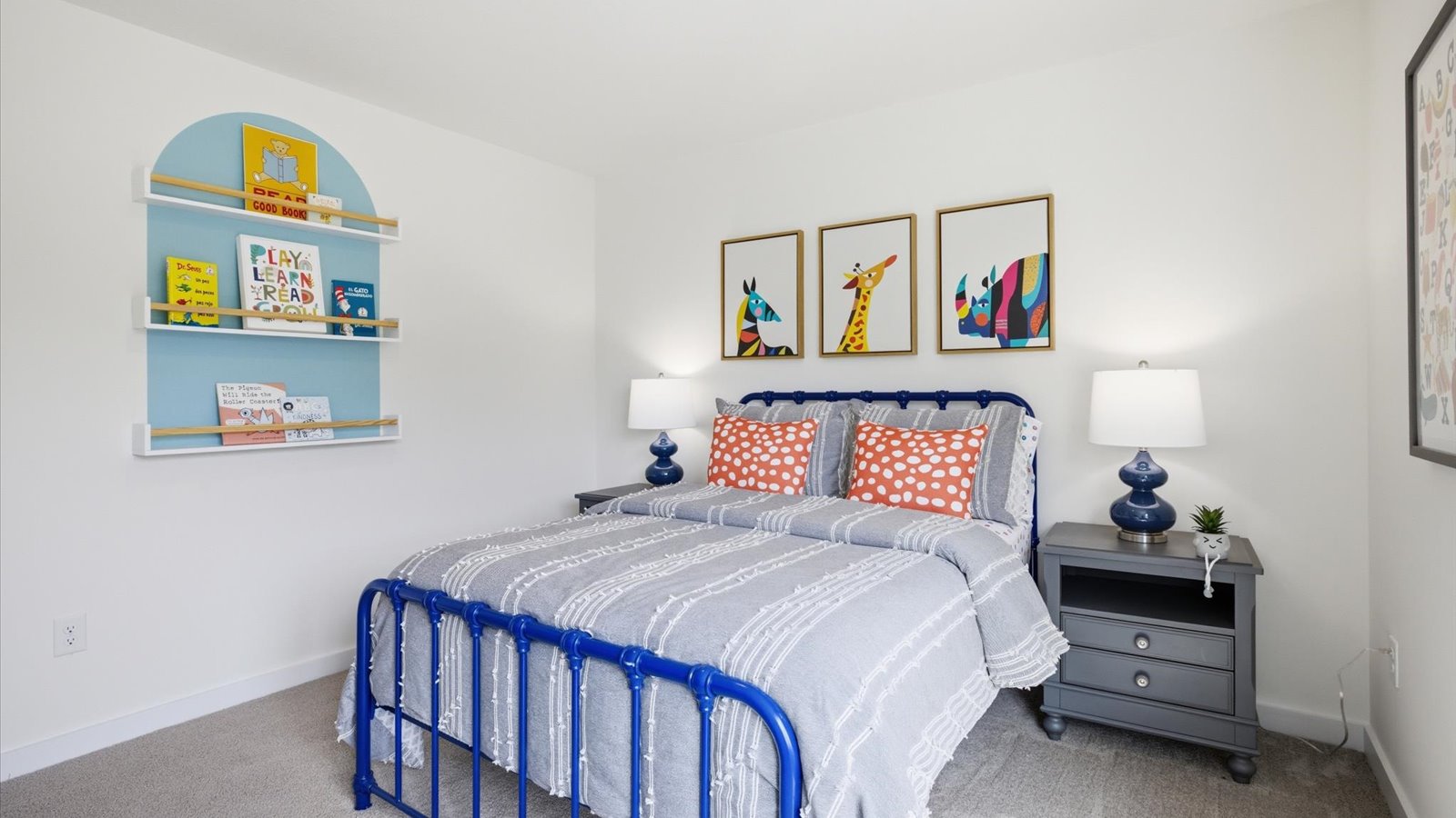 Bedroom with ample natural light and carpet floors