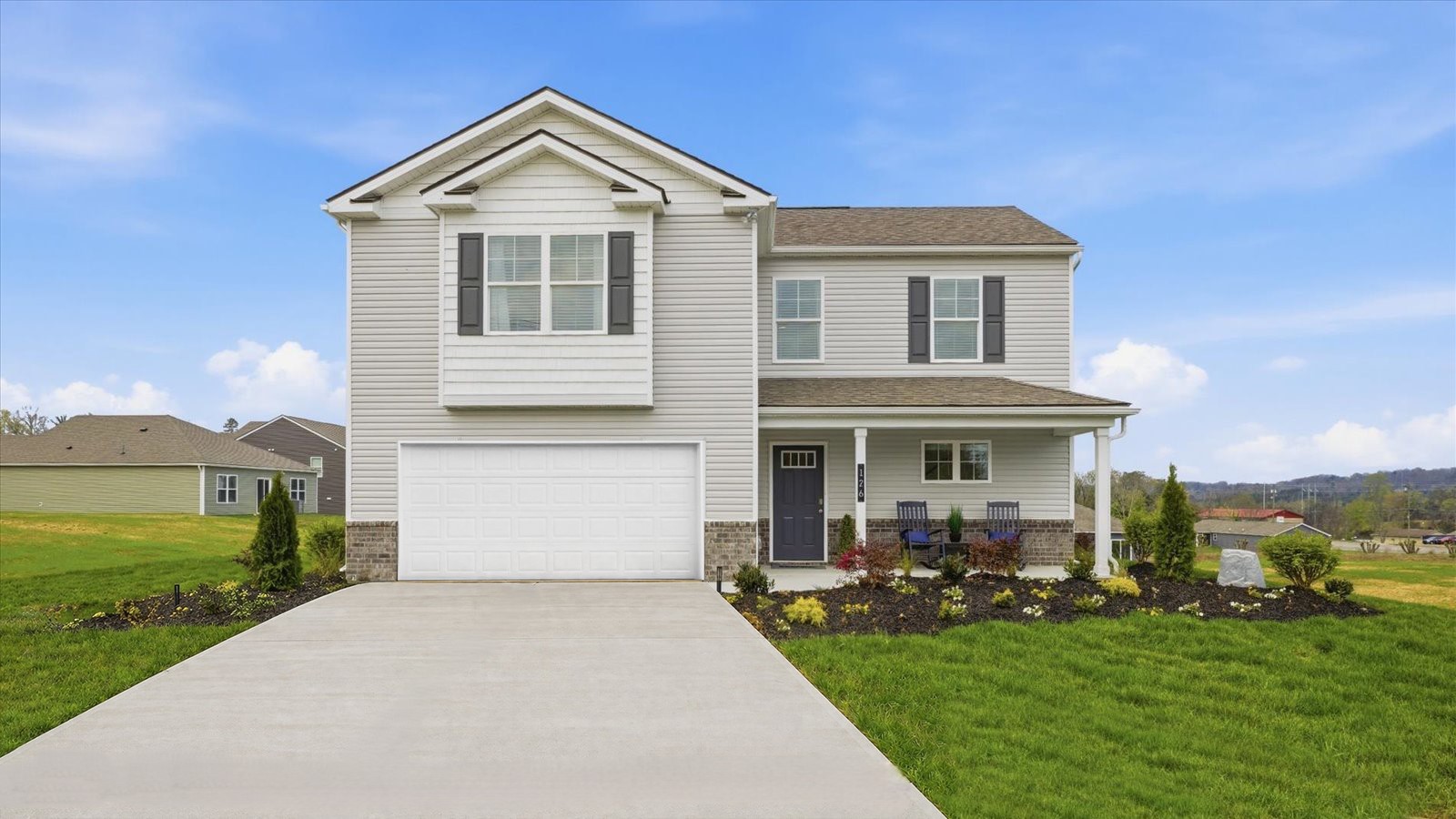 Exterior rendering of two story modern home with brick accents