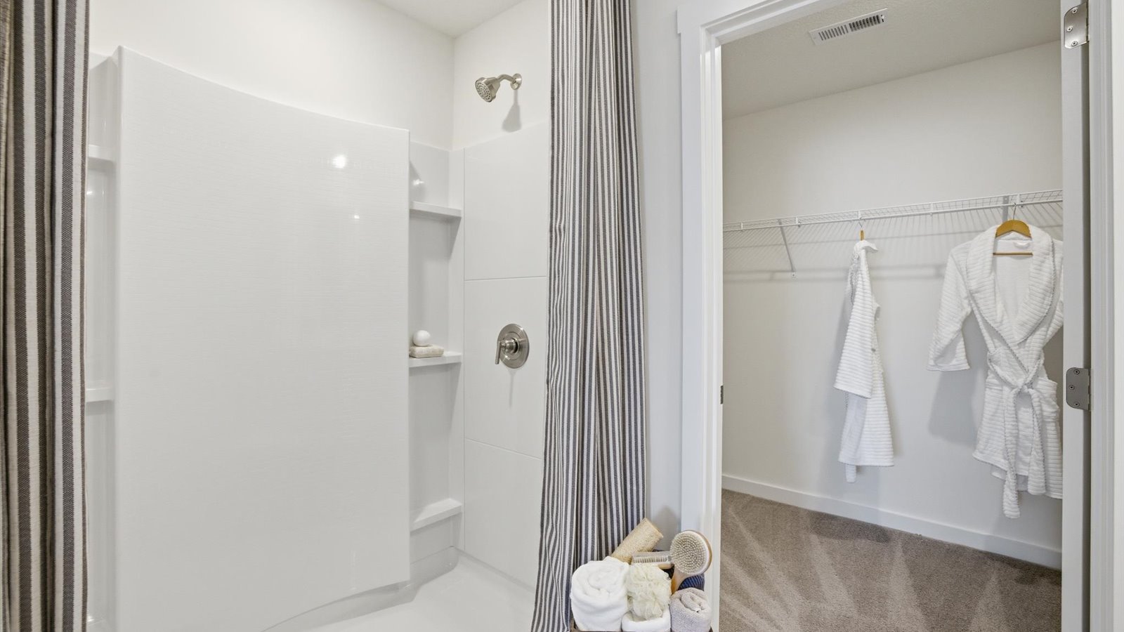 large walk-in closet with shelving